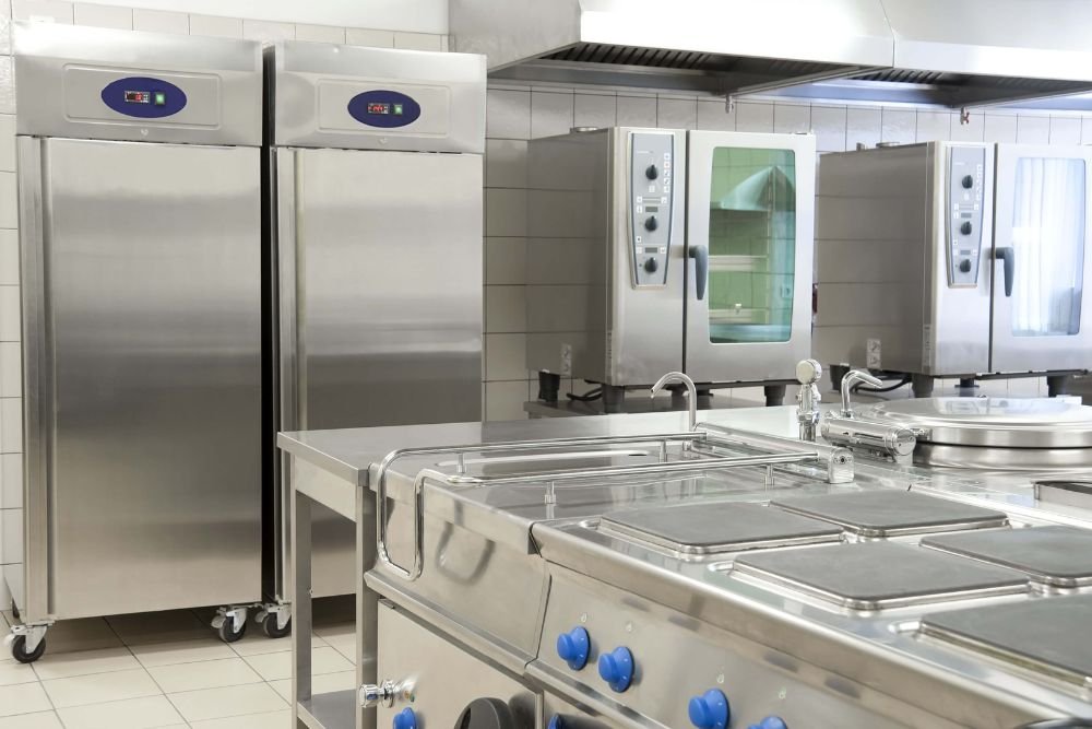 A well-equipped commercial kitchen showcasing stainless steel appliances, relevant to appliance repair services in Fresno, CA.